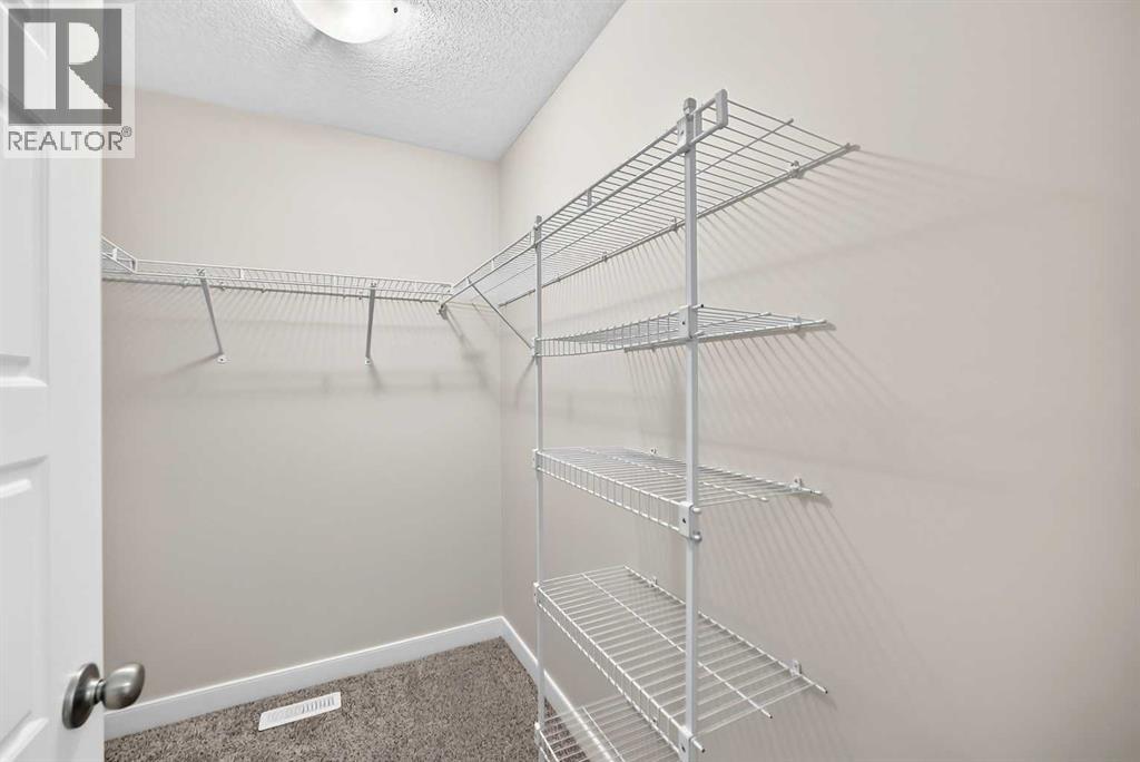 86 Pantego Lane NW, Calgary, Alberta  T3K 0T1 - Photo 27 - A2338242