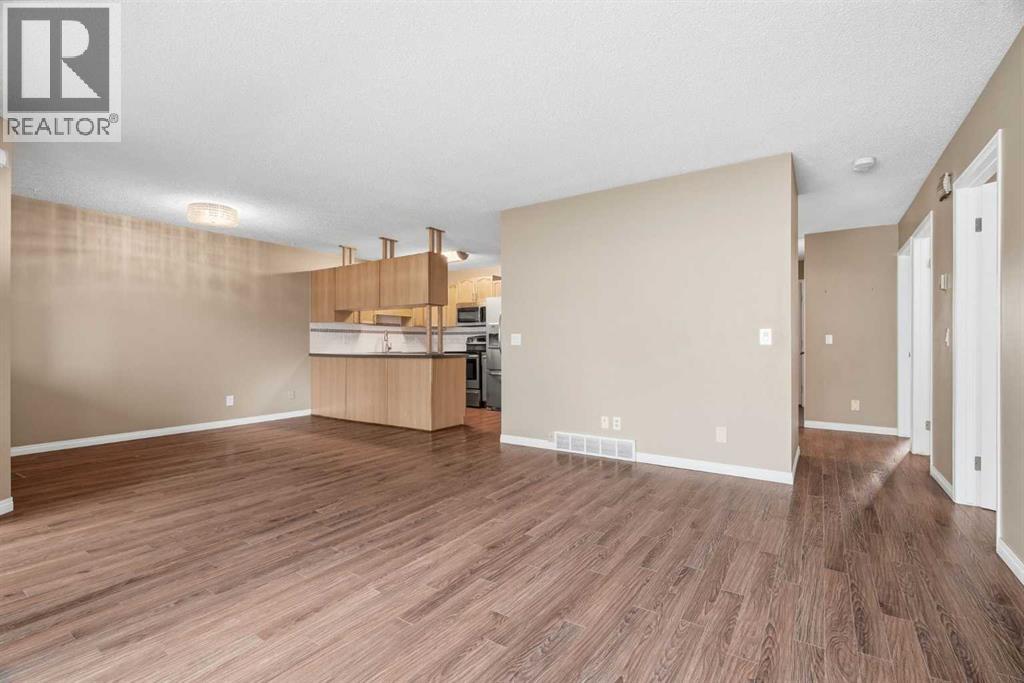 11 Macewan Park Heights NW, Calgary, Alberta  T3K 3W6 - Photo 5 - A2339194
