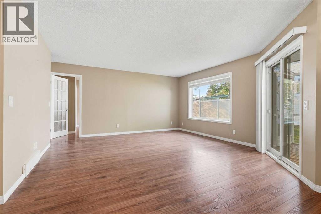 11 Macewan Park Heights NW, Calgary, Alberta  T3K 3W6 - Photo 3 - A2339194