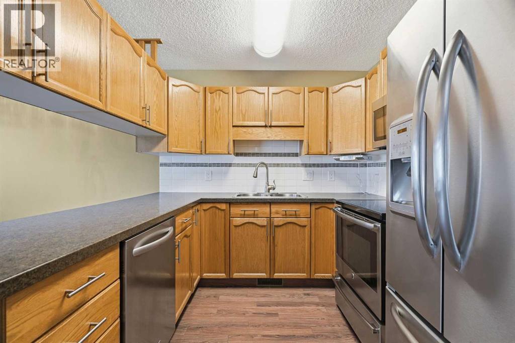 11 Macewan Park Heights NW, Calgary, Alberta  T3K 3W6 - Photo 12 - A2339194