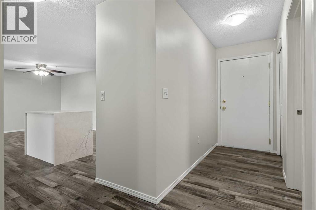 1211, 1211 Tuscarora Manor NW, Calgary, Alberta  T3L 2J9 - Photo 4 - A2337831