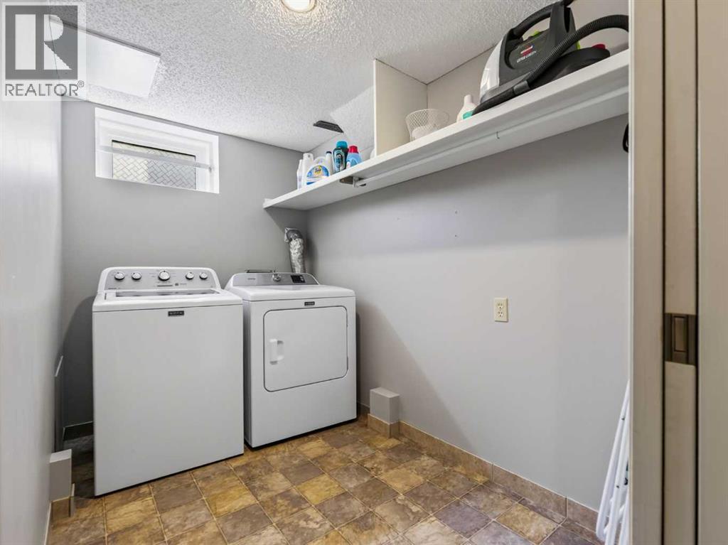115 Wood Valley Court Sw, Calgary, Alberta  T2W 5S4 - Photo 38 - A2338304