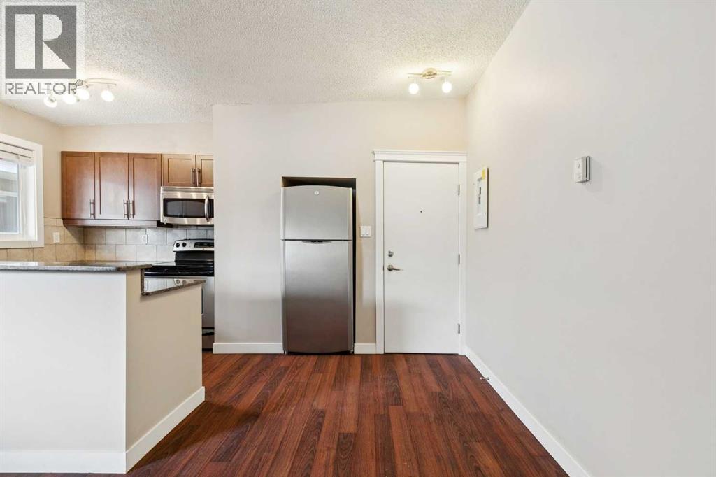 4, 605 67 Avenue SW, Calgary, Alberta  T2V 0M3 - Photo 2 - A2316843