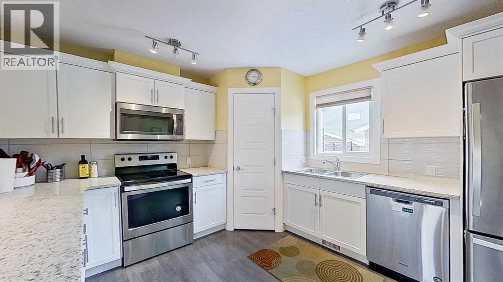 109 Heartland Boulevard, Cochrane, Alberta  T4C 2R1 - Photo 6 - A2292507
