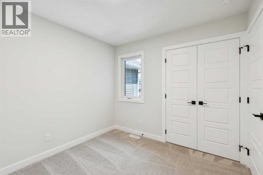 24 Southborough Common, Cochrane, Alberta  T4C 3J7 - Photo 31 - A2324378