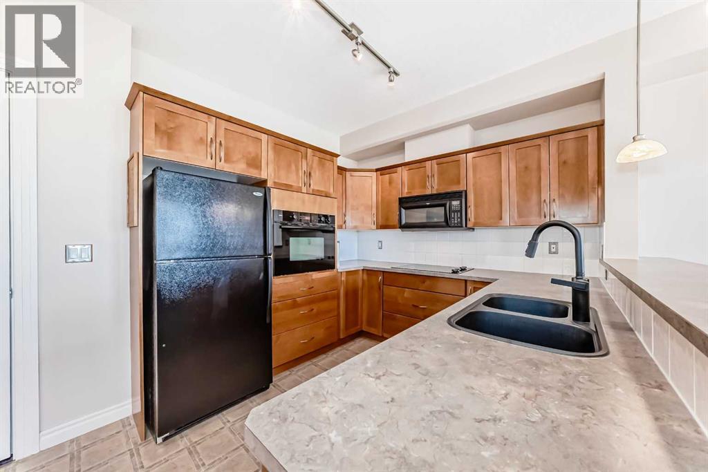 410, 3111 34 Avenue NW, Calgary, Alberta  T3R 1X8 - Photo 17 - A2314548