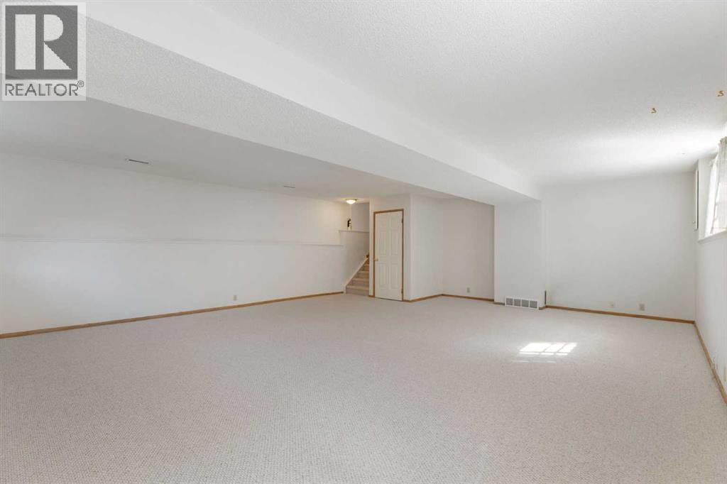 90 Martinridge Crescent NE, Calgary, Alberta  T3J 3M4 - Photo 28 - A2337975