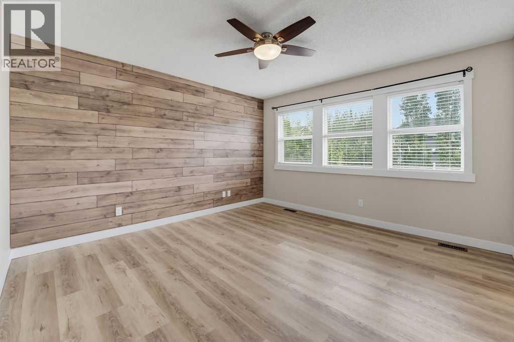 145 Sunset Manor, Cochrane, Alberta  T4C 0N2 - Photo 25 - A2339058