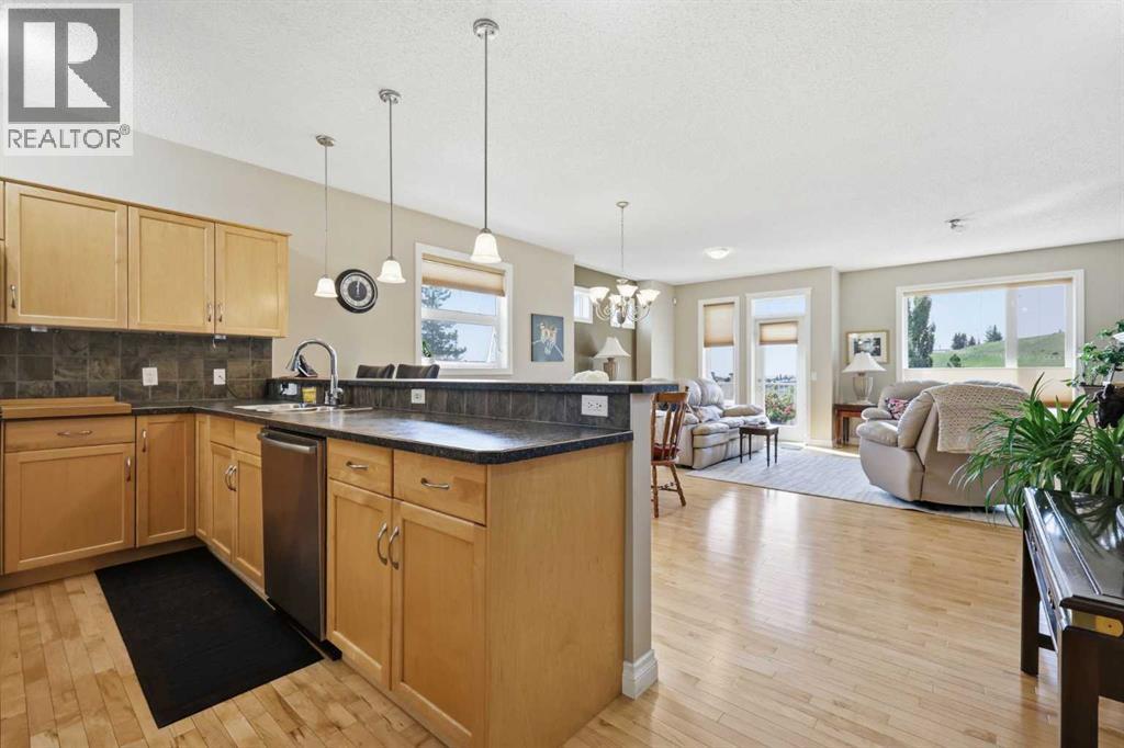112, 1000 Glenhaven Way, Cochrane, Alberta  T4C 1Y9 - Photo 4 - A2338624