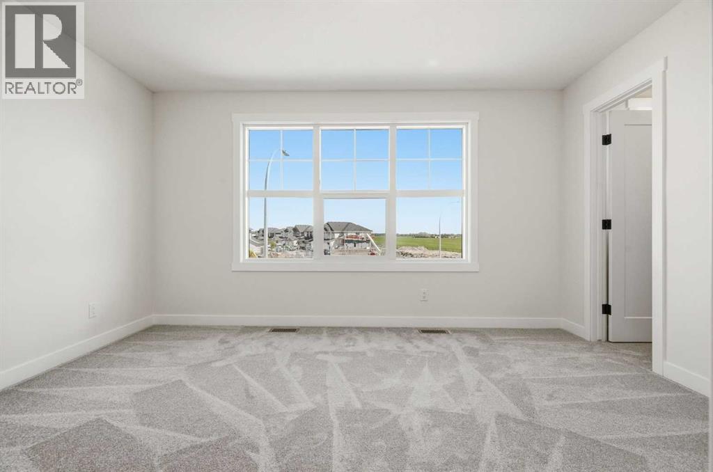 319 Kinniburgh Loop, Chestermere, Alberta  T1X 3C3 - Photo 28 - A2337606