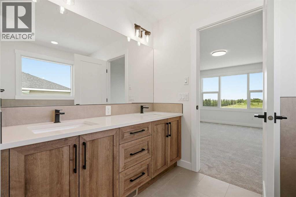 319 Kinniburgh Loop, Chestermere, Alberta  T1X 3C3 - Photo 43 - A2337606