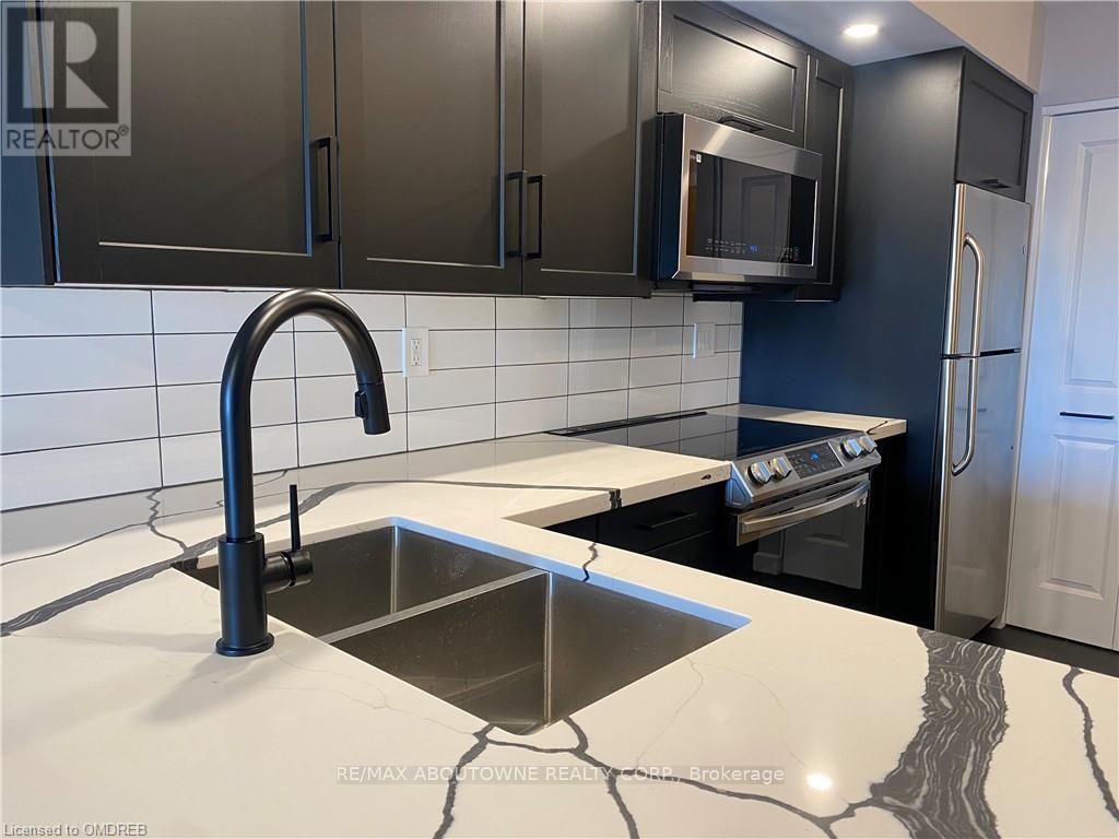 305 - 100 Bronte Road, Oakville, Ontario L6L 6L5 - Photo 4 - W13701828