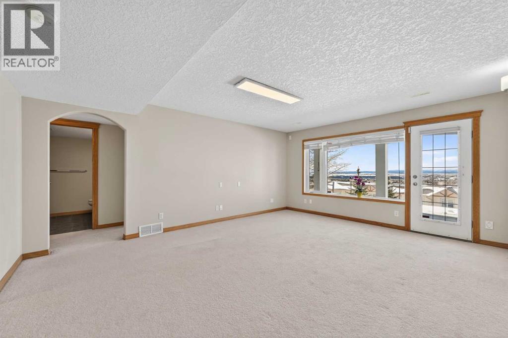359 Rocky Ridge Drive NW, Calgary, Alberta  T3G 4X3 - Photo 37 - A2334046