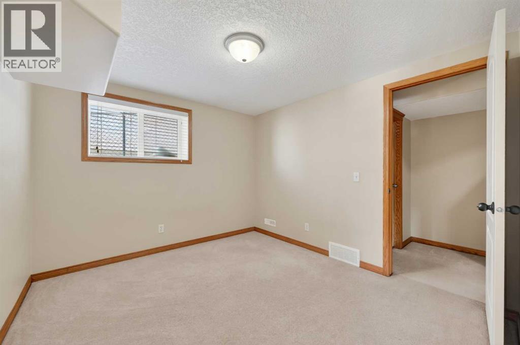 359 Rocky Ridge Drive NW, Calgary, Alberta  T3G 4X3 - Photo 35 - A2334046