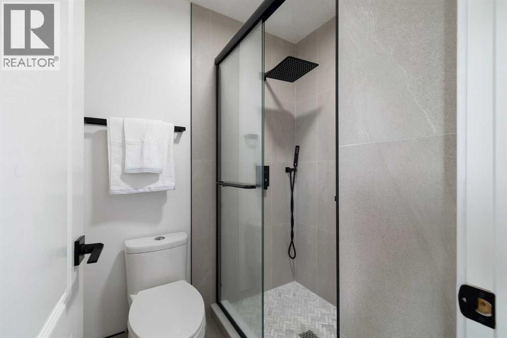 56 West Cedar Rise SW, Calgary, Alberta  T3H 5E2 - Photo 26 - A2338388