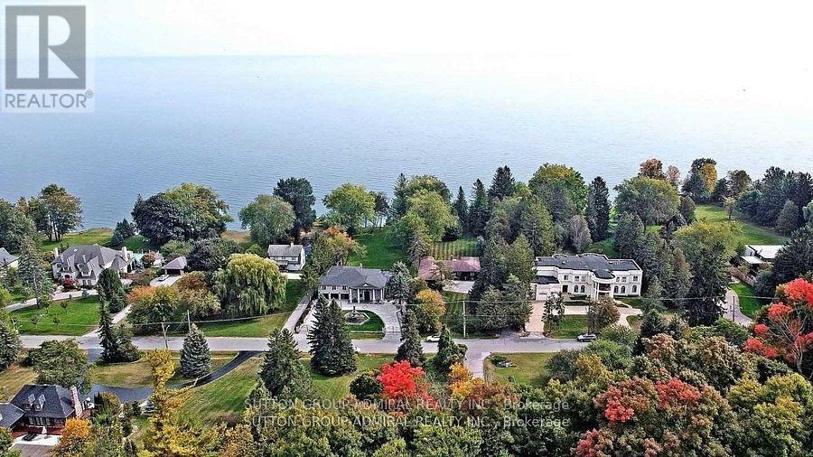 <div class="slider-price">$3,795,000</div><p>48 Meadowcliffe Drive, Toronto, Ontario</p>