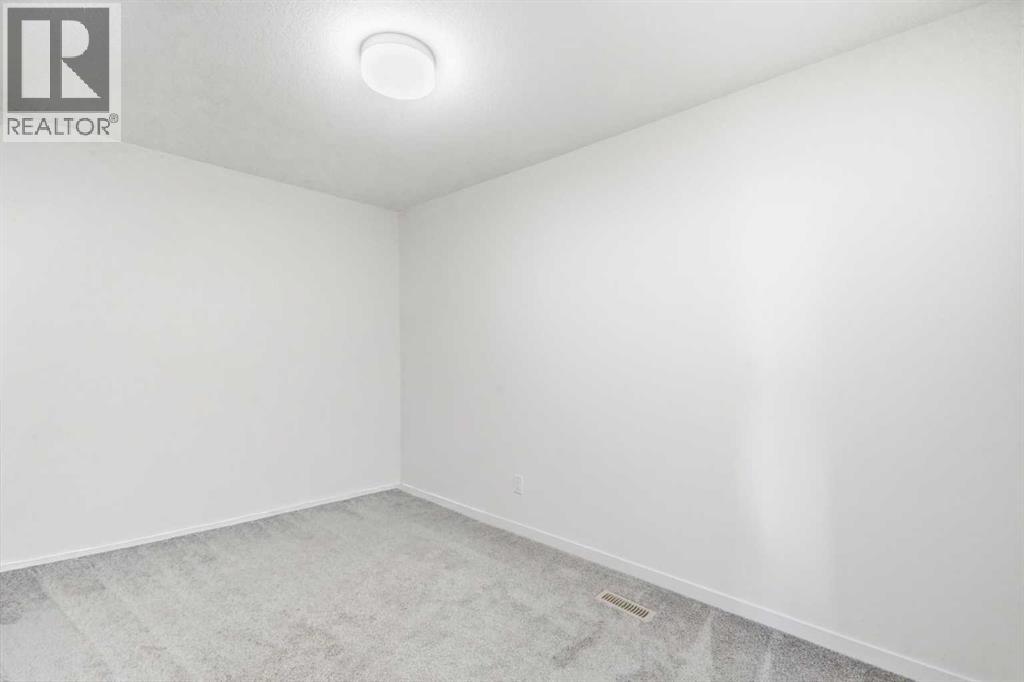 105 South Point Manor SW, Airdrie, Alberta  T4B 5M8 - Photo 21 - A2339290