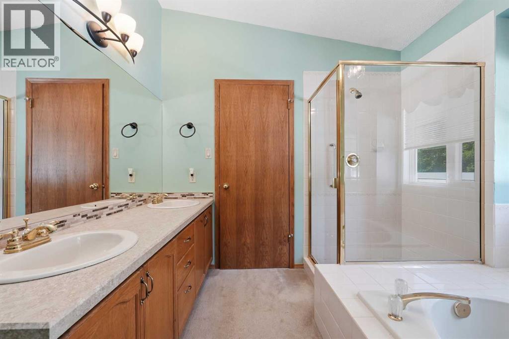 22a Woodmeadow Close Sw, Calgary, Alberta  T2W 4L8 - Photo 22 - A2317102