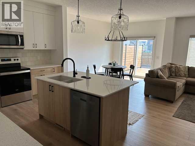 115 Fireside Street, Cochrane, Alberta  T4C 3J2 - Photo 8 - A2303910
