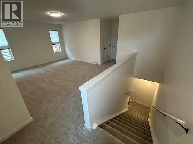 115 Fireside Street, Cochrane, Alberta  T4C 3J2 - Photo 15 - A2303910