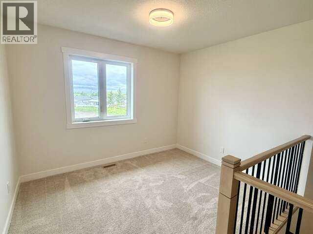 844 Beckner Street, Carstairs, Alberta  T0M 0N0 - Photo 32 - A2320737