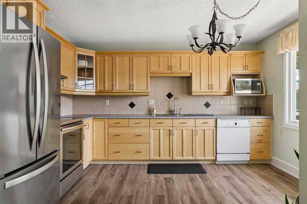 1824 Lake Bonavista Drive SE, Calgary, Alberta  T2J 3A9 - Photo 9 - A2331806
