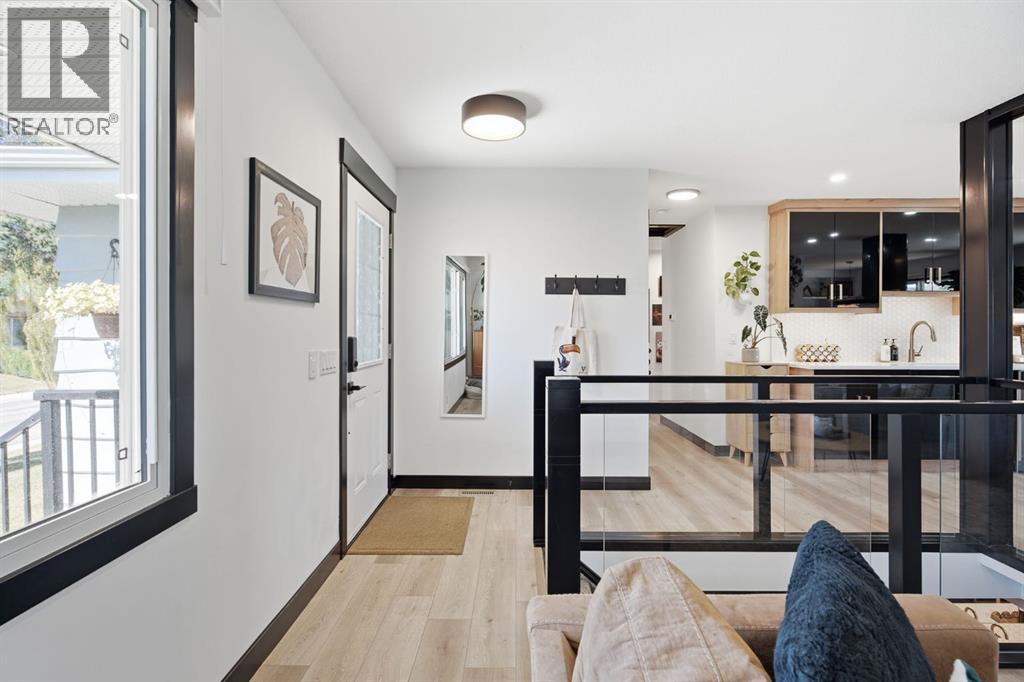 180 Huntford Road NE, Calgary, Alberta  T2K 3Y9 - Photo 3 - A2332801