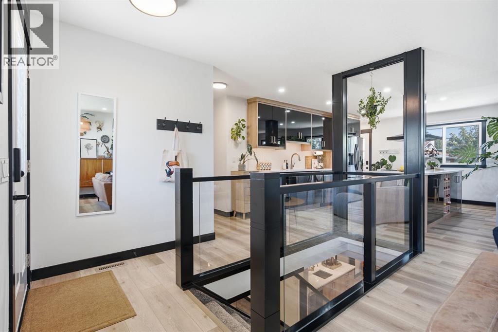 180 Huntford Road NE, Calgary, Alberta  T2K 3Y9 - Photo 4 - A2332801