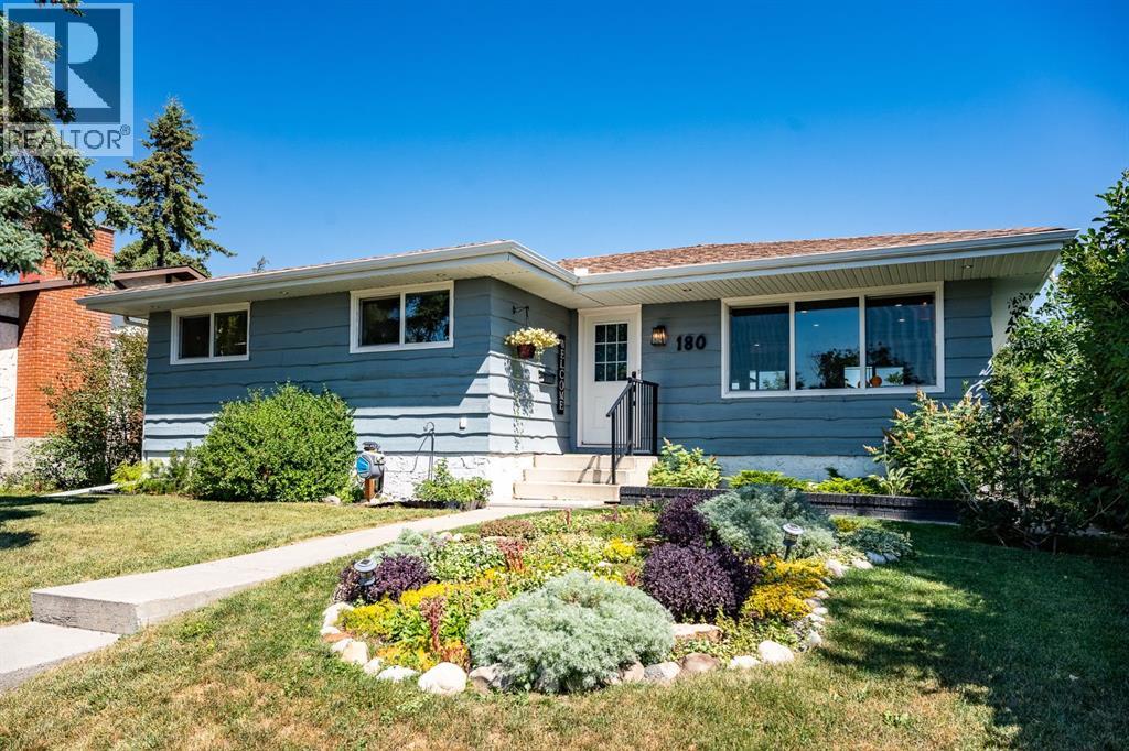 180 Huntford Road NE, Calgary, Alberta  T2K 3Y9 - Photo 2 - A2332801