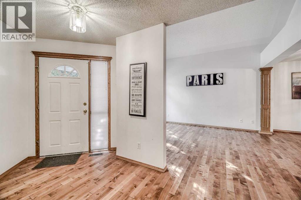 10057 Hamptons Boulevard NW, Calgary, Alberta  T3A 4Y6 - Photo 4 - A2335792