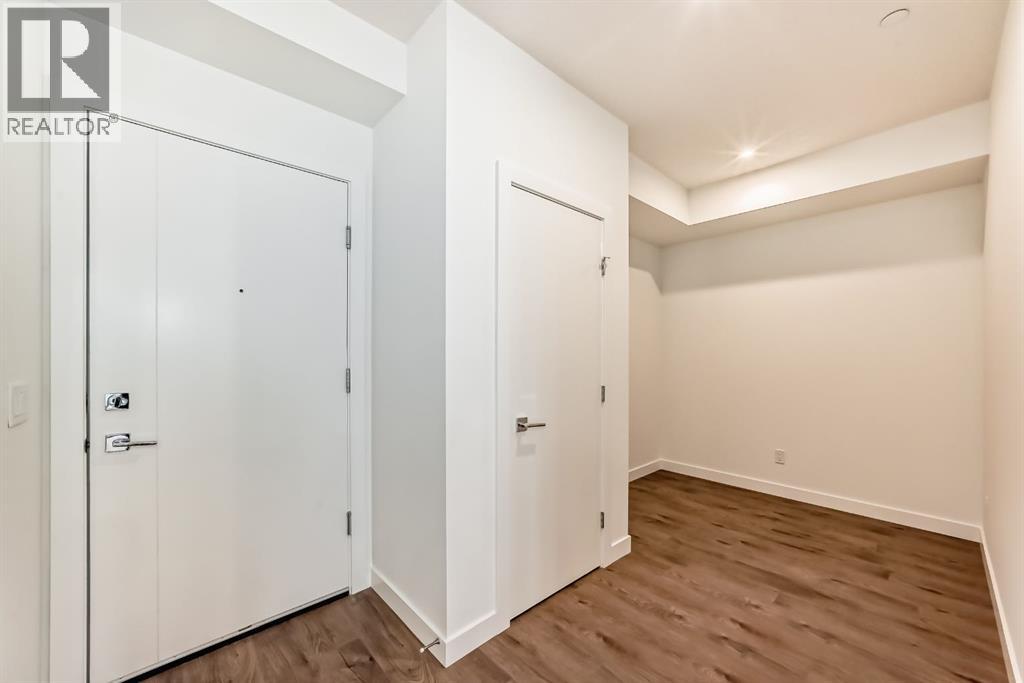 205, 8370 Broadcast Avenue SW, Calgary, Alberta  T3H 6L3 - Photo 2 - A2338975