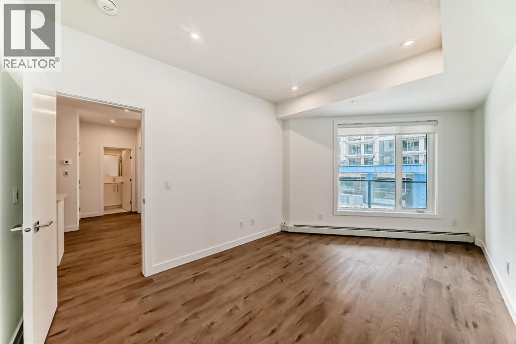 205, 8370 Broadcast Avenue SW, Calgary, Alberta  T3H 6L3 - Photo 15 - A2338975