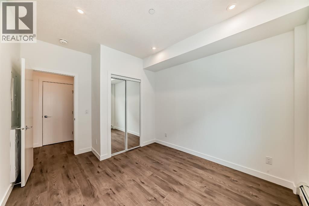 205, 8370 Broadcast Avenue SW, Calgary, Alberta  T3H 6L3 - Photo 23 - A2338975