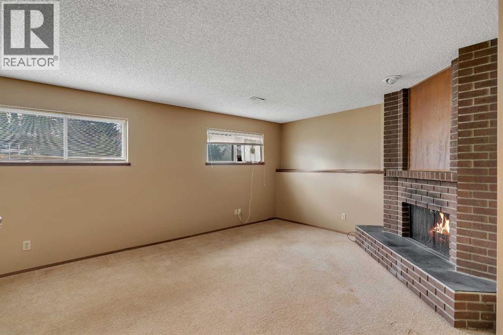 703 Woodpark Boulevard SW, Calgary, Alberta T2W 3M9 - Photo 19 - A2325598
