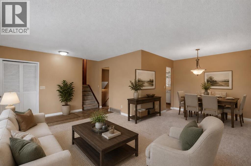 703 Woodpark Boulevard SW, Calgary, Alberta T2W 3M9 - Photo 3 - A2325598