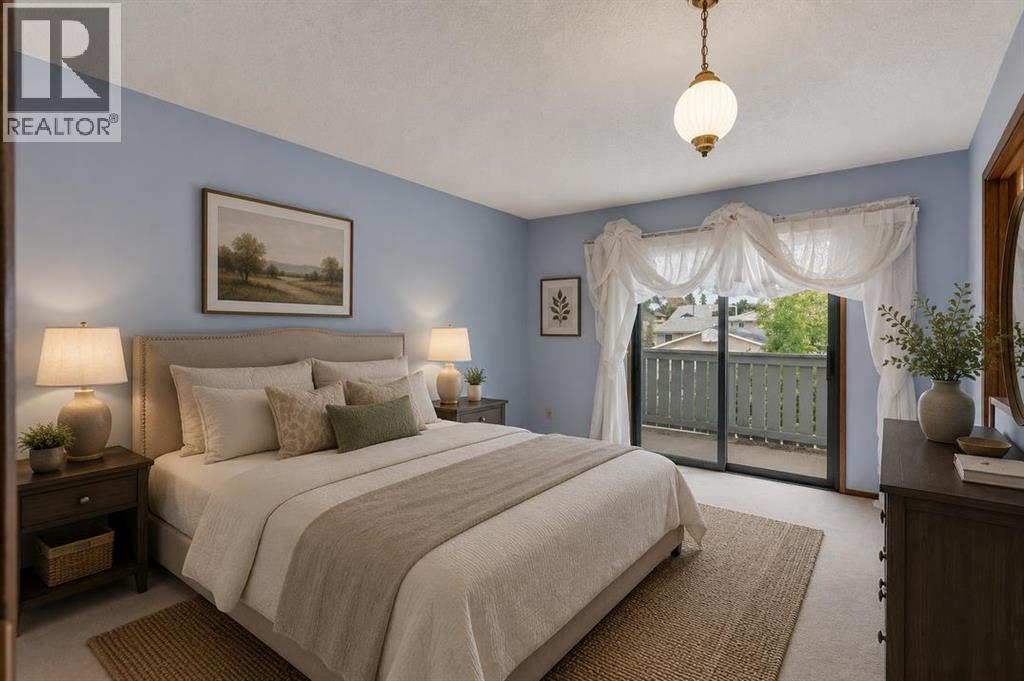 703 Woodpark Boulevard SW, Calgary, Alberta T2W 3M9 - Photo 10 - A2325598