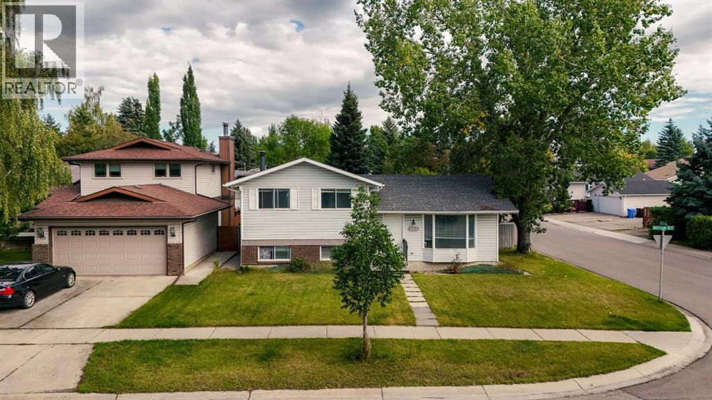 703 Woodpark Boulevard SW, Calgary, Alberta T2W 3M9 - Photo 32 - A2325598