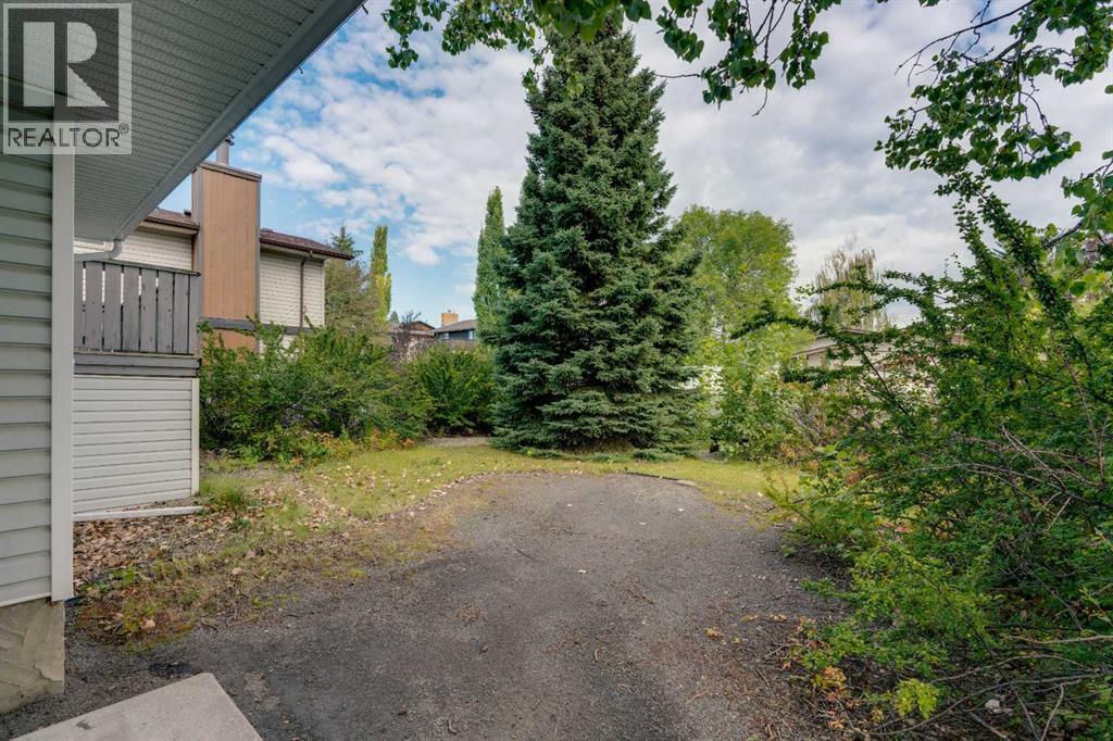 703 Woodpark Boulevard SW, Calgary, Alberta T2W 3M9 - Photo 28 - A2325598