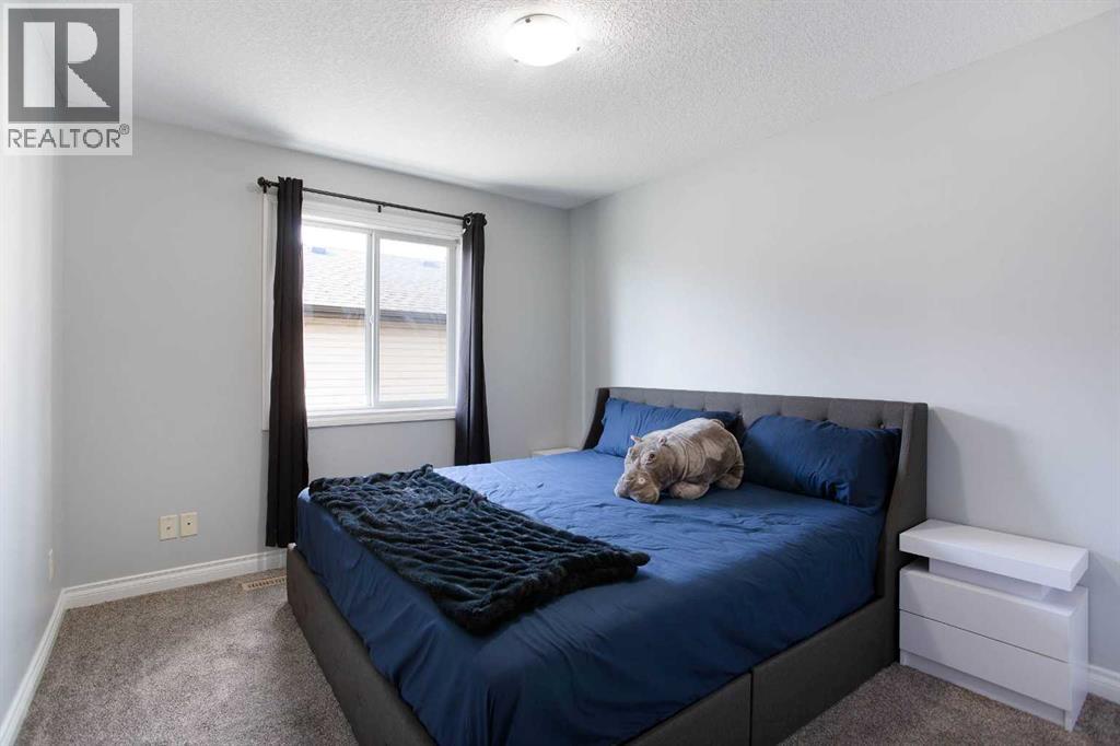 1925 Luxstone Park Sw, Airdrie, Alberta  T4B 3B5 - Photo 30 - A2328960