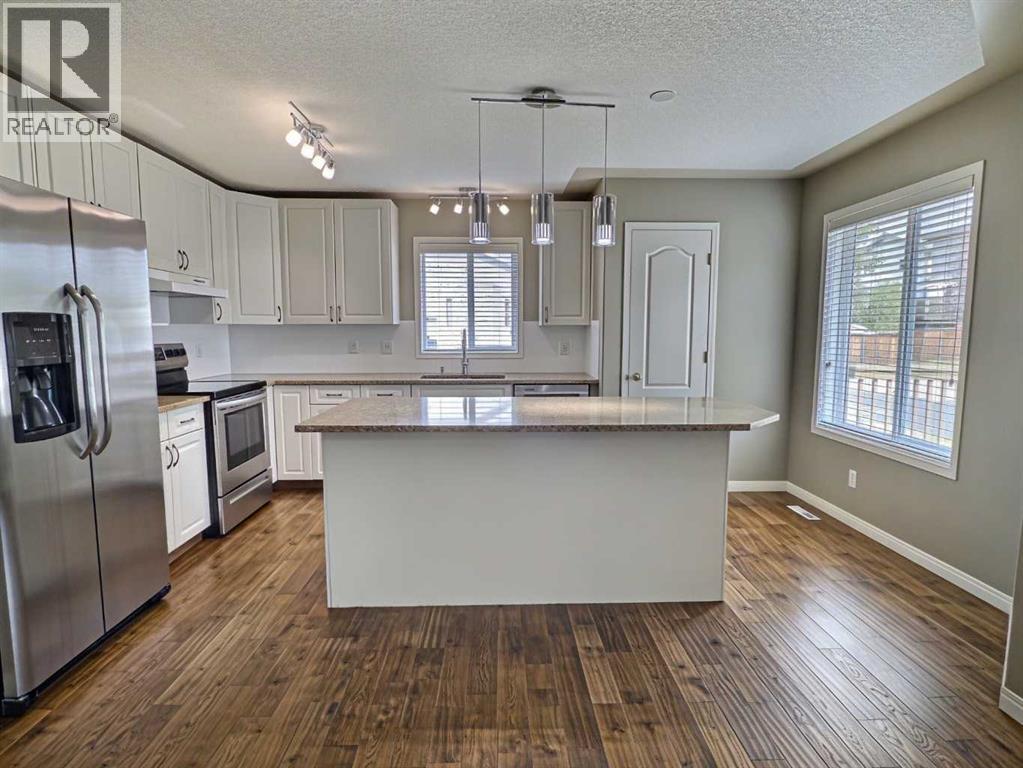 185 Tuscarora Close NW, Calgary, Alberta  T3L 2E3 - Photo 8 - A2330549
