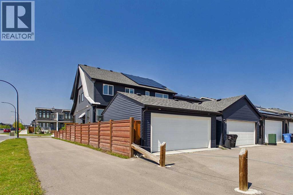 182 Rowley Gate NW, Calgary, Alberta  T3L 0H7 - Photo 4 - A2338450