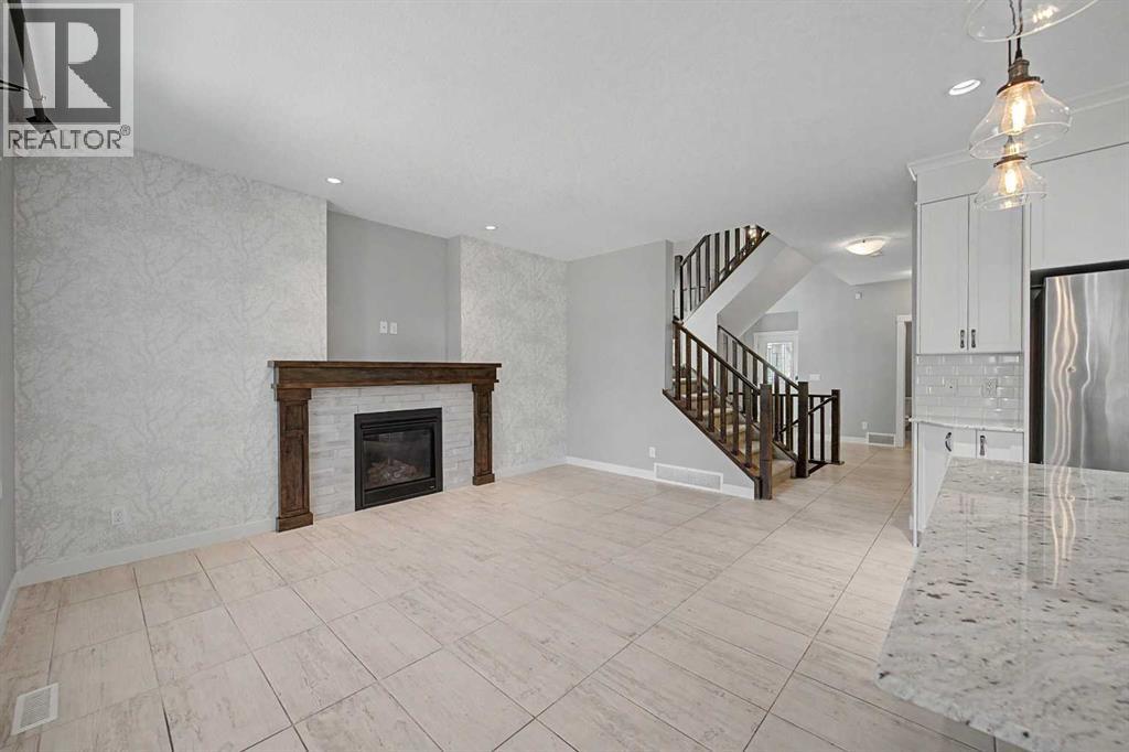 604 Midtown Place Sw, Airdrie, Alberta  T4B 4E3 - Photo 5 - A2335225