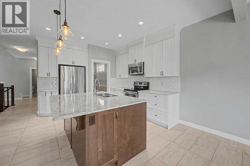 604 Midtown Place Sw, Airdrie, Alberta  T4B 4E3 - Photo 9 - A2335225