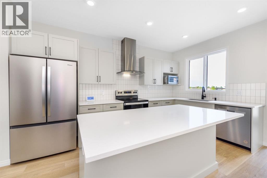 115 Huxland Road Ne, Calgary, Alberta  T2A 5Z9 - Photo 4 - A2321010