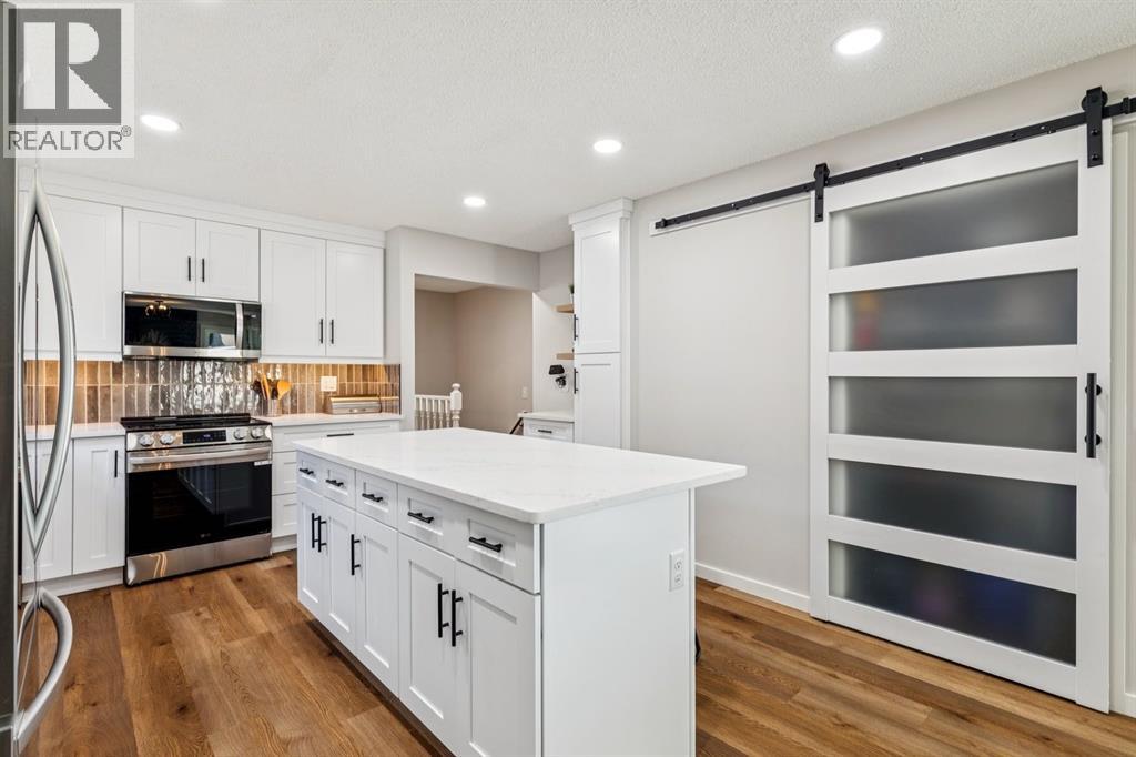 92 Woodford Drive SW, Calgary, Alberta  T2W 4C3 - Photo 17 - A2339414