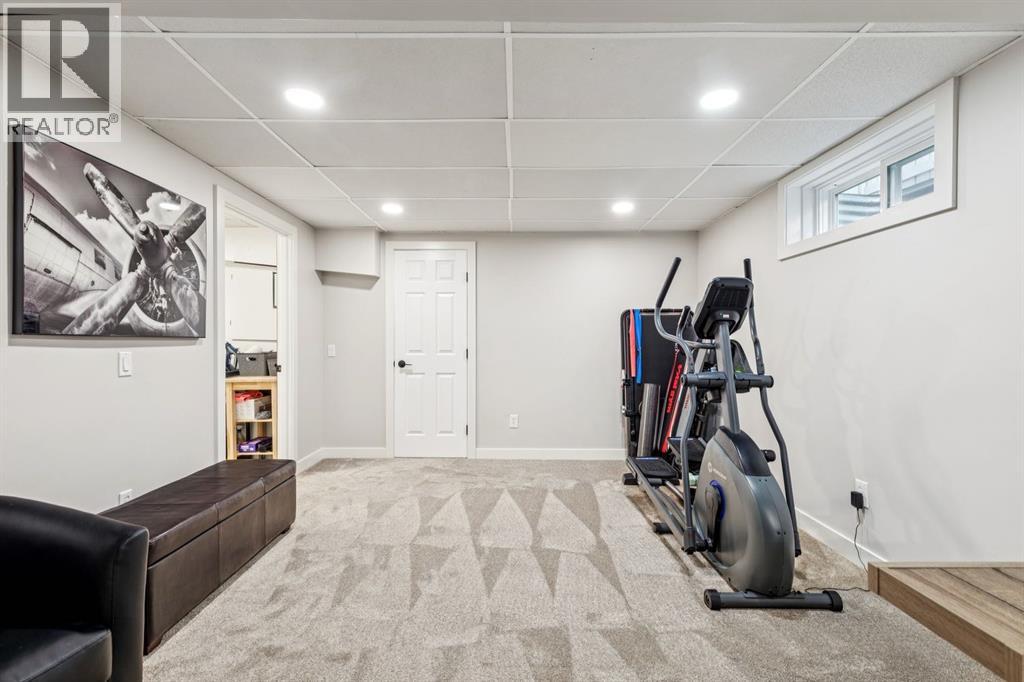 92 Woodford Drive SW, Calgary, Alberta  T2W 4C3 - Photo 37 - A2339414