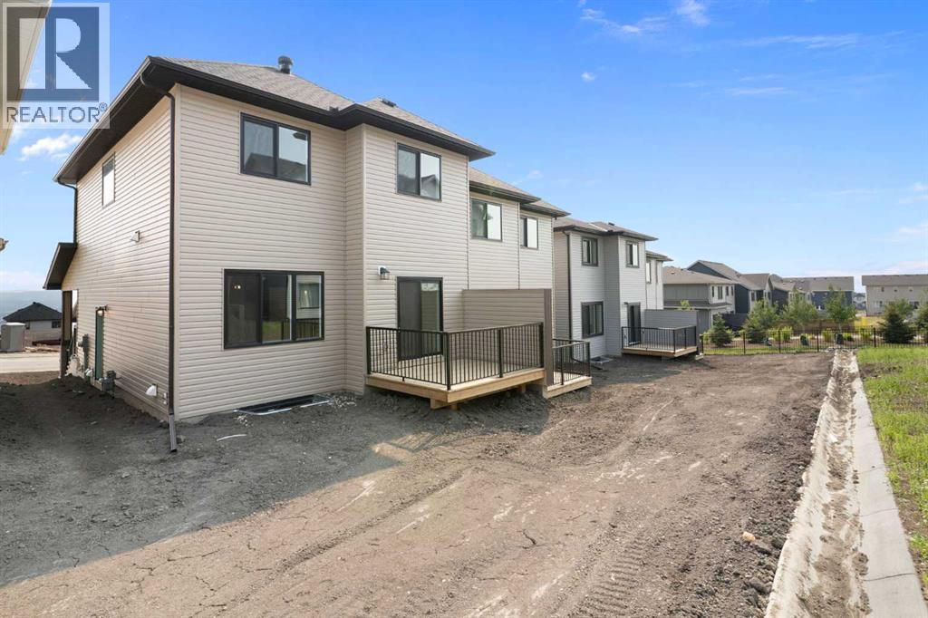 91 Heritage Manor, Cochrane, Alberta  T4C 3K8 - Photo 43 - A2333344