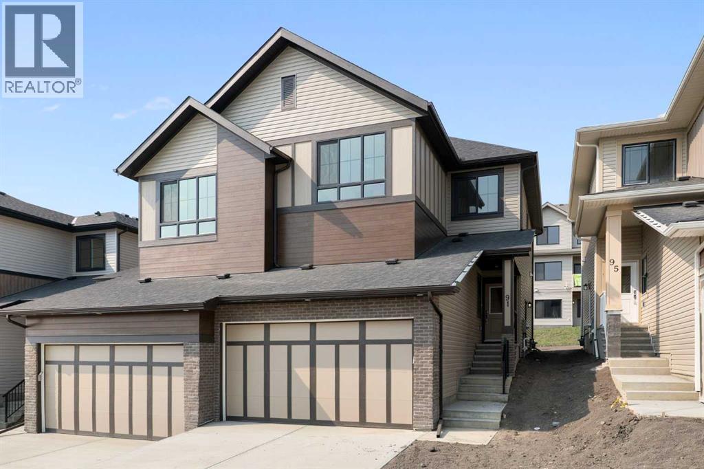 91 Heritage Manor, Cochrane, Alberta  T4C 3K8 - Photo 2 - A2333344