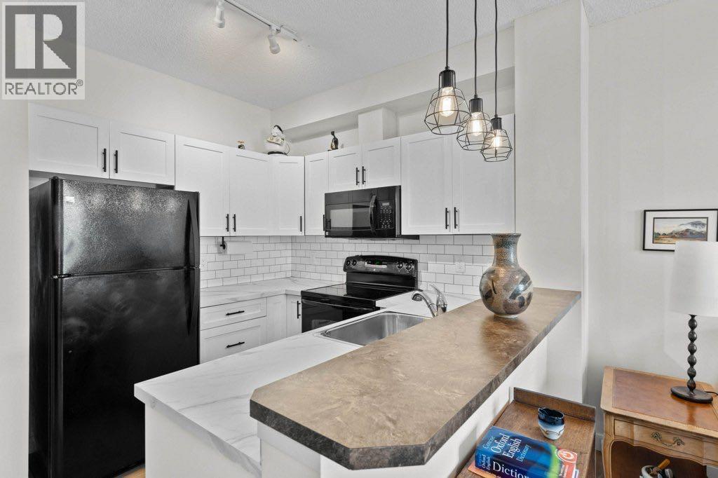 304, 201 Sunset Drive, Cochrane, Alberta  T4C 0H5 - Photo 8 - A2326716