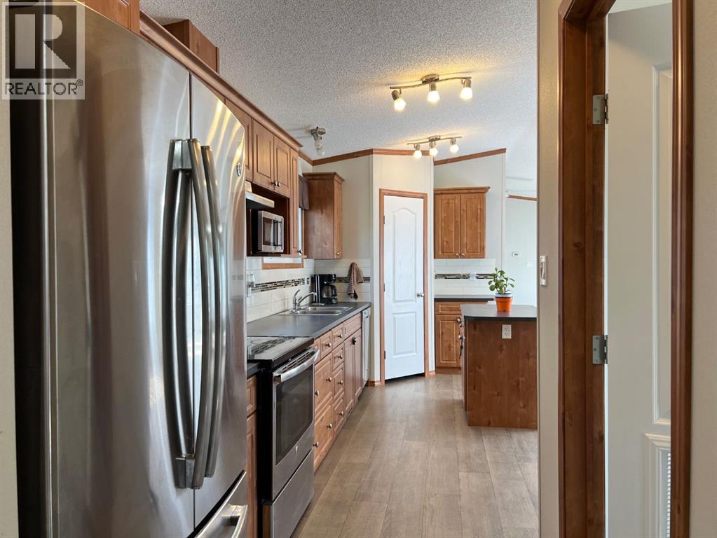 4002 Seasons Boulevard, Coaldale, Alberta  T1M 0C6 - Photo 6 - A2332662